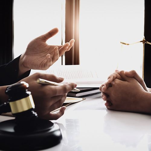 Hands on a desk